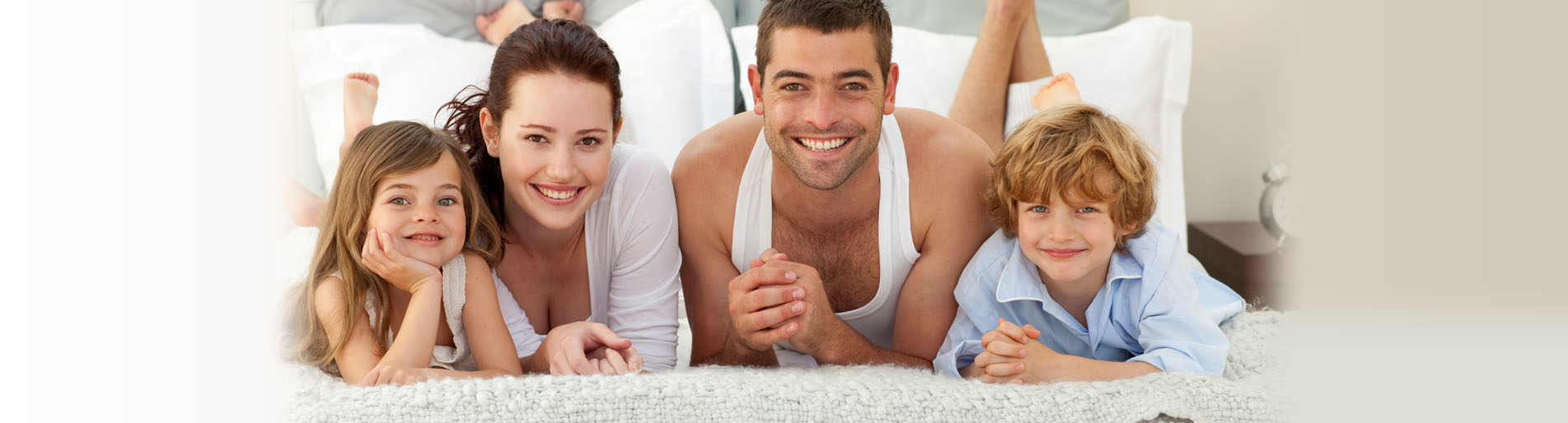 Family on bed